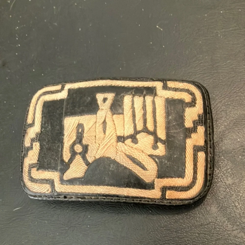 Leather and embroidered belt buckle